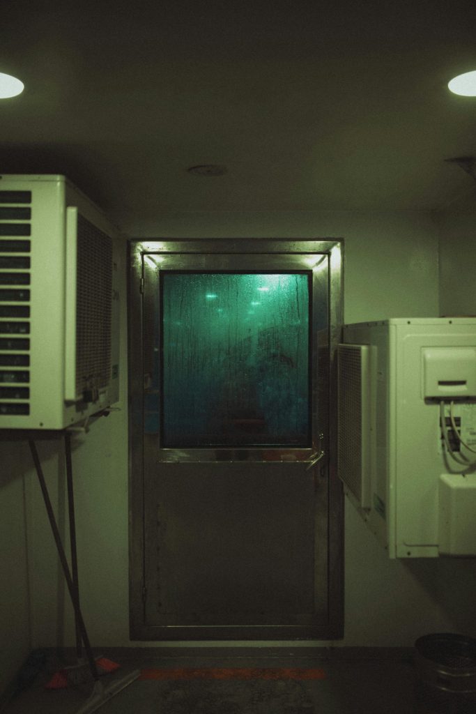 Interior view of a modern industrial room with air conditioning and metallic door in İstanbul, Turkey.